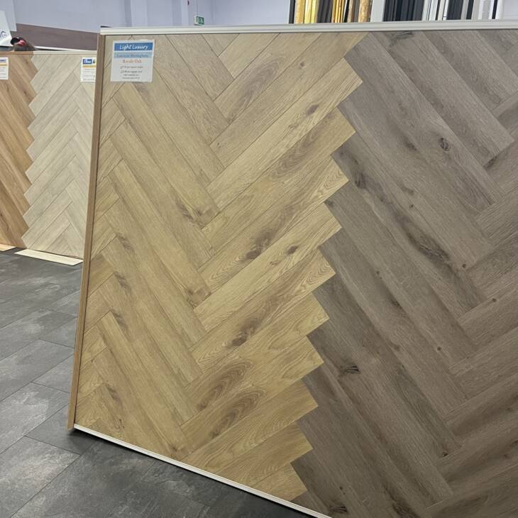Light Luxury 12mm Herringbone - Royale Oak