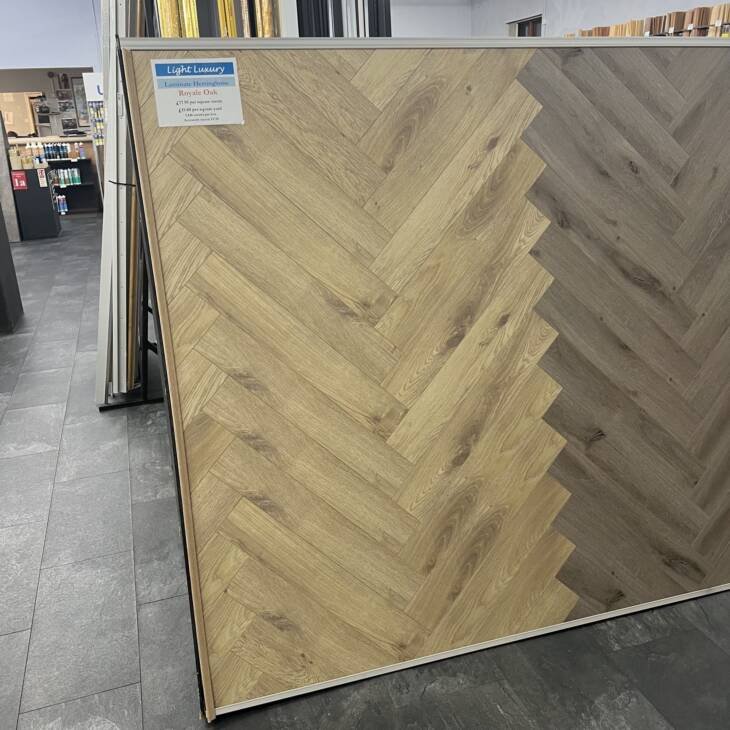 Light Luxury 12mm Herringbone - Royale Oak
